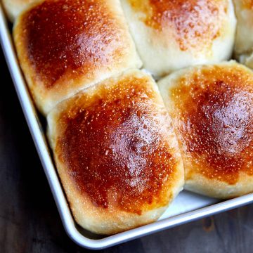 Golden brown yeast roll in a pan