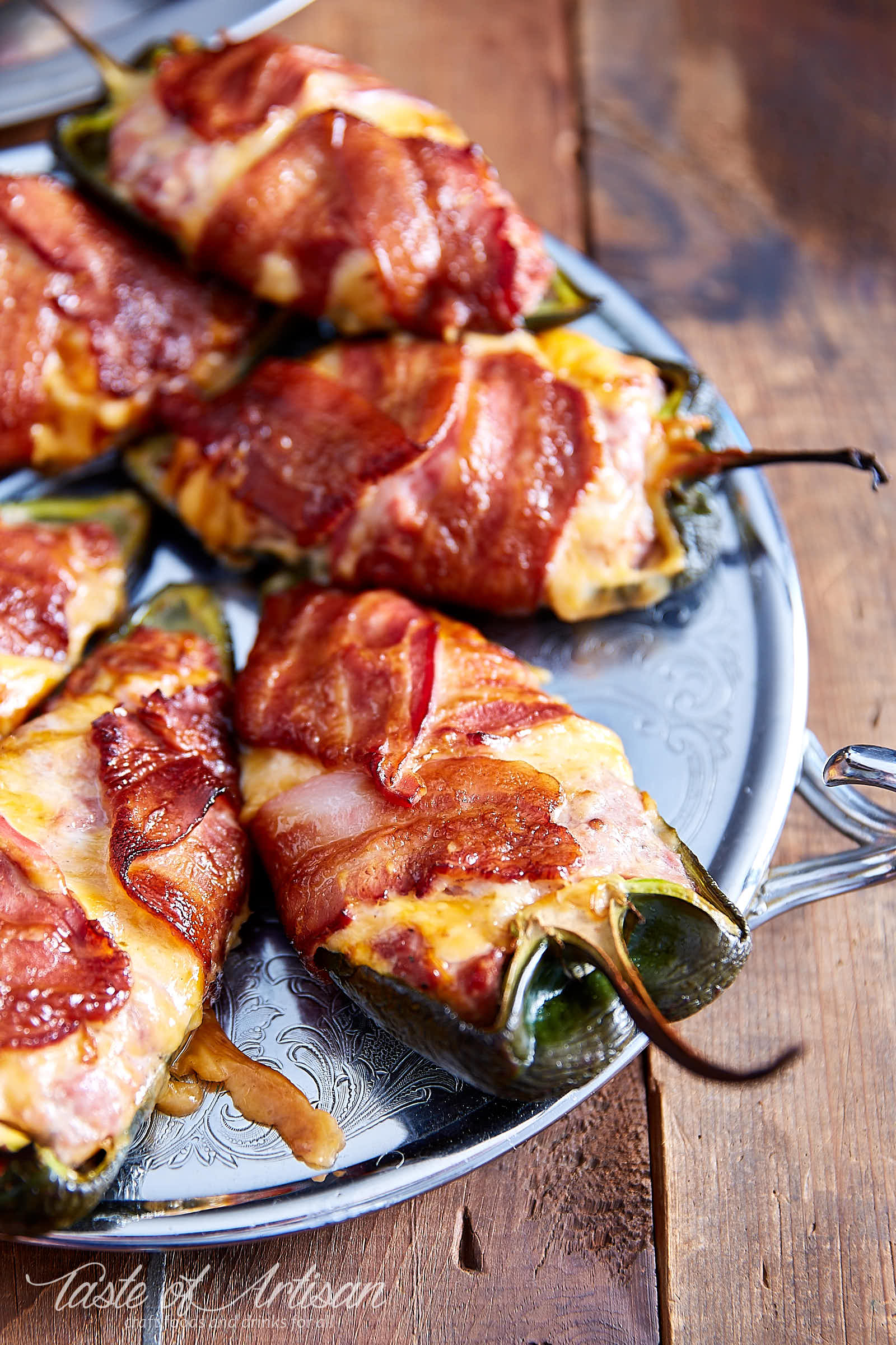 The best smoked stuffed poblano pepper recipe. The peppers are smoky, meaty, cheesy and absolutely delicious. Serve with mashed potatoes. | Taste of Artisan