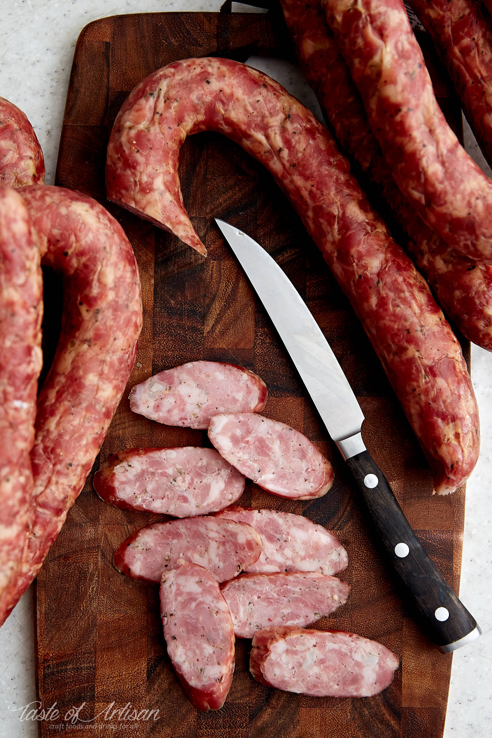 Learn how to make authentic Polish kielbasa (sausage) at home. The name of this kielbasa is Swojska, which means homemade or self-made. It's one of the best and most flavorful Polish sausages.| Taste of Artisan