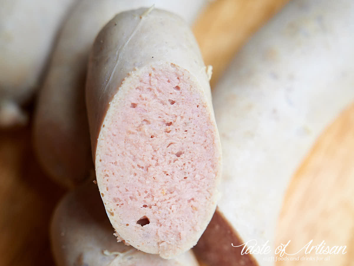 Close up of cut bockwurst sausage.