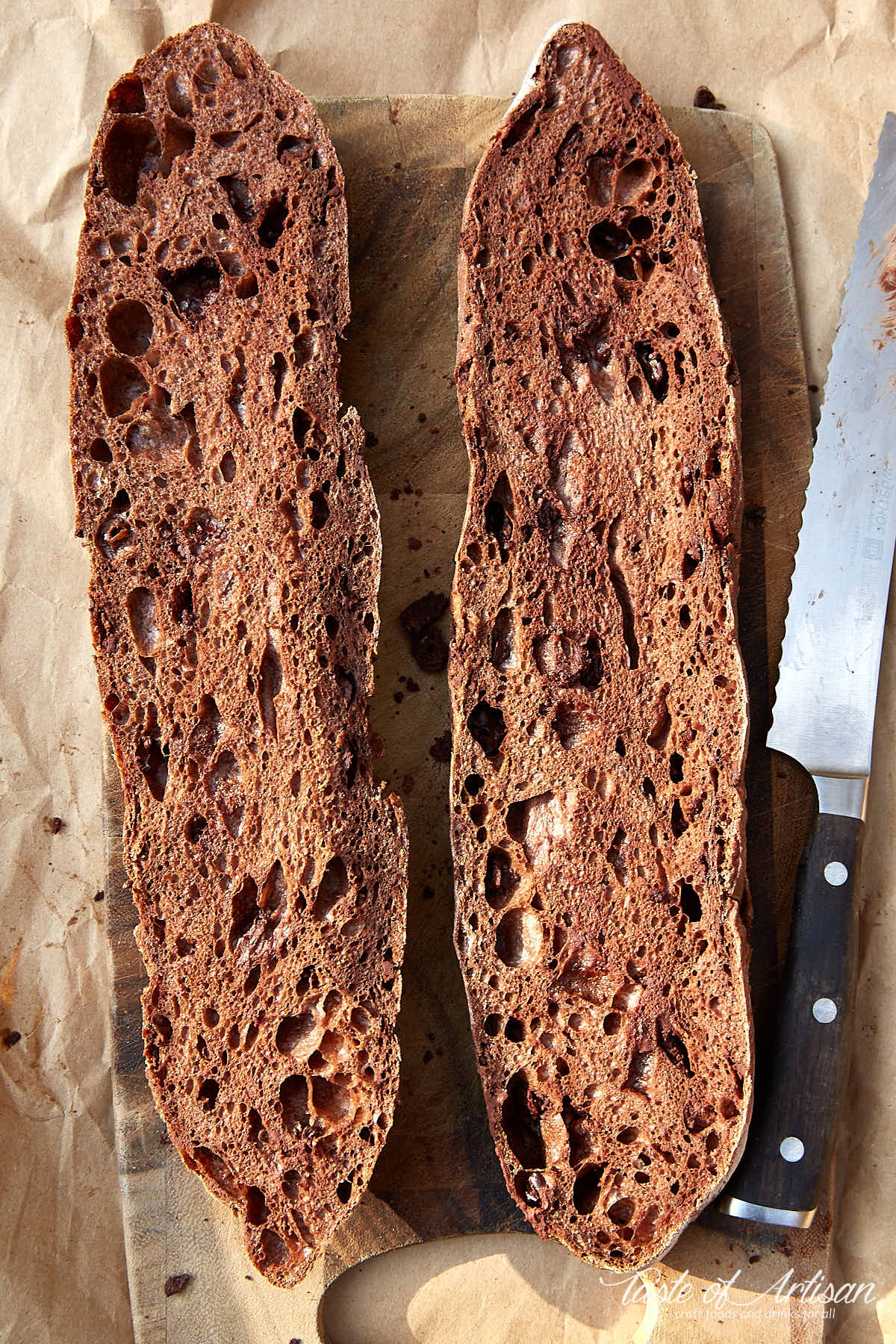 Chocolate baguette cut in half, beautiful crumb visible.