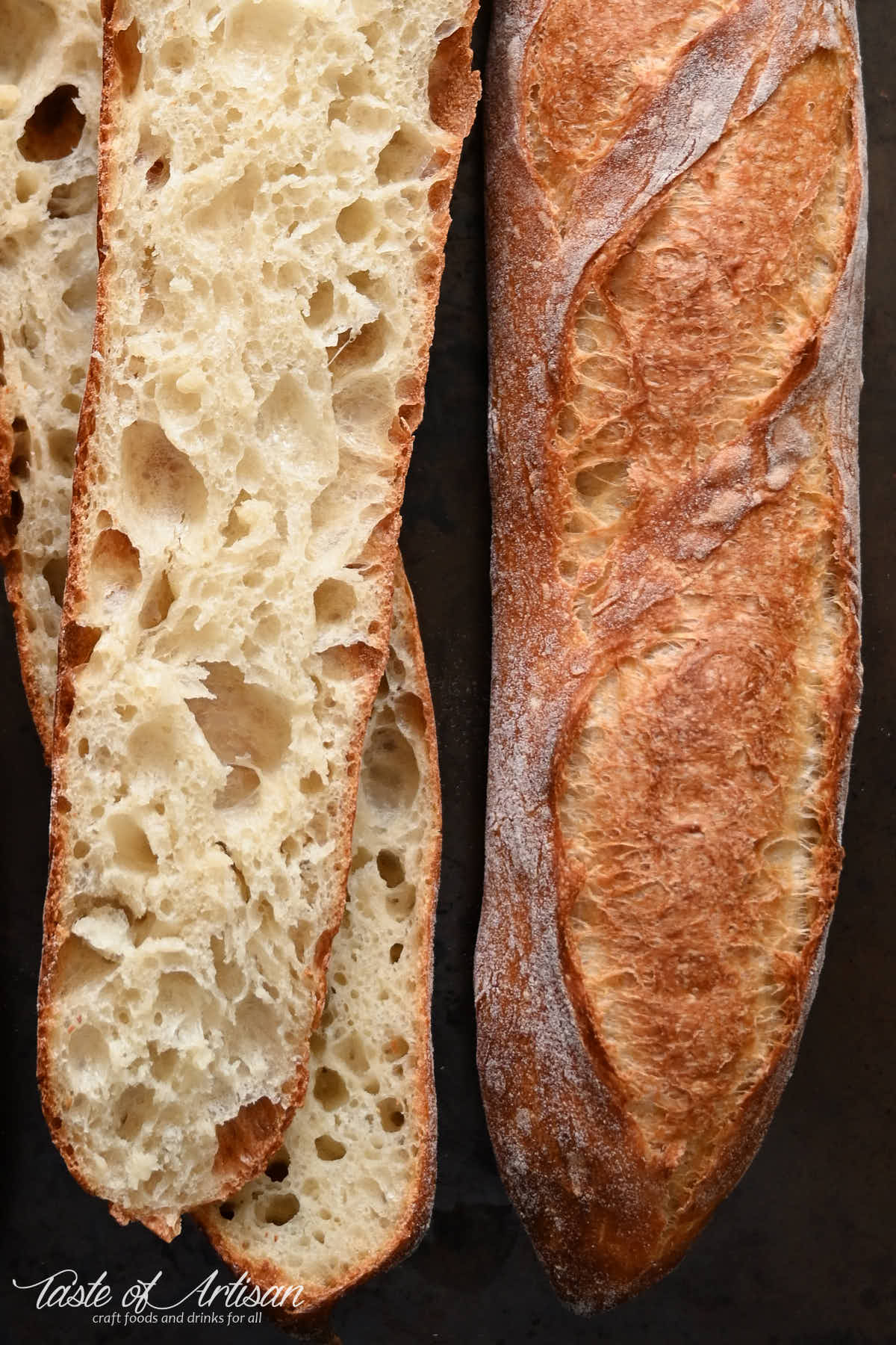 Close up of French baguette crumbs and crispy crust.