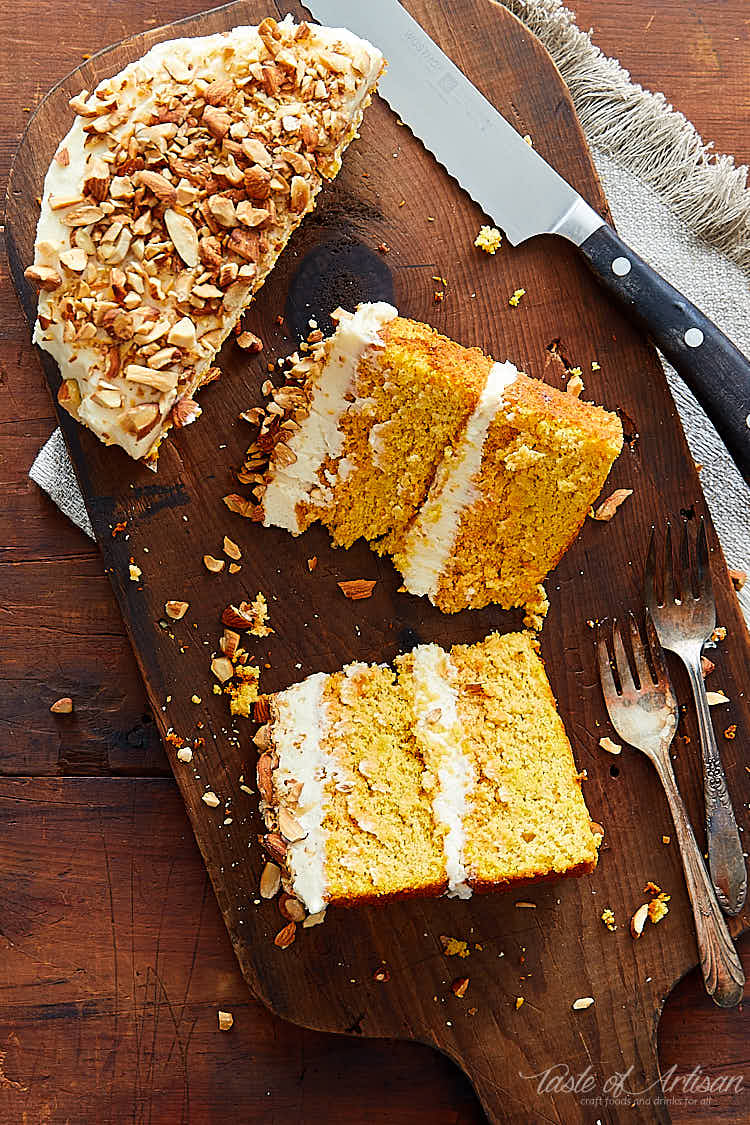 Slices of gluten-free carrot cake on a cutting board.