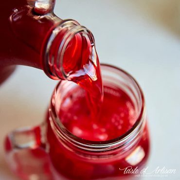 Mors drink being poured into a glass.