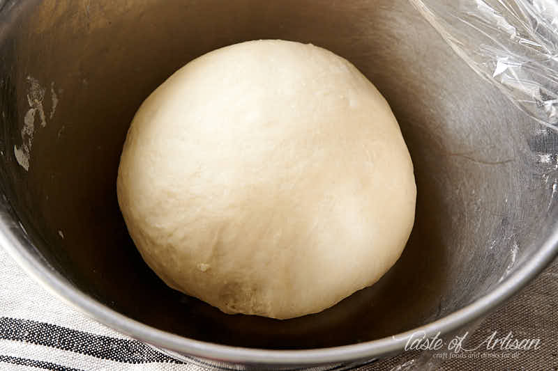 Dough for pampushki in a bowl.