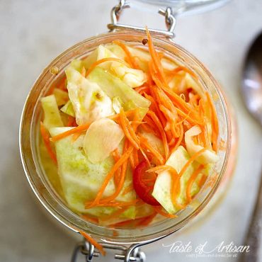 top down view of a jar filled with pickled cabbage.