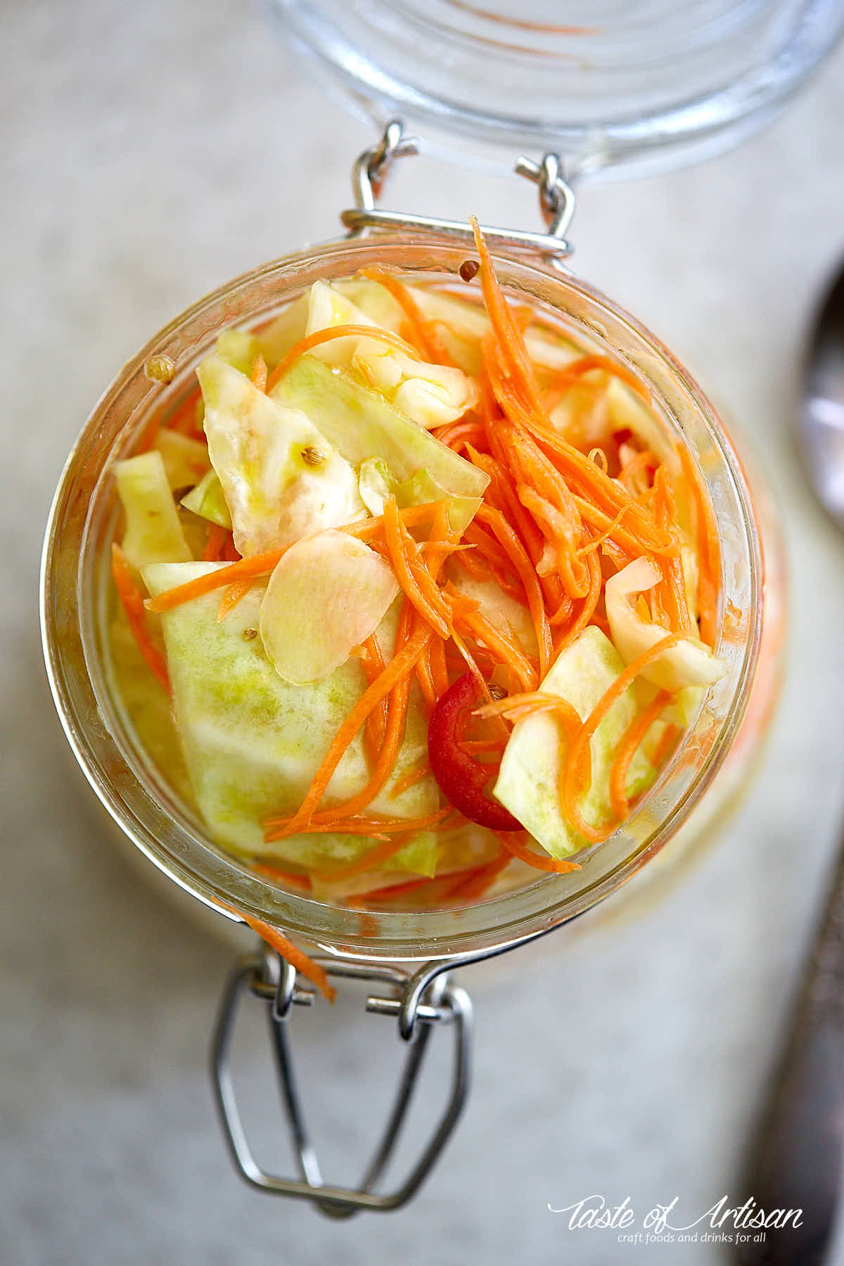 top down view of a jar filled with pickled cabbage.