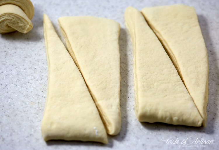 Croissant dough cut into triangles.