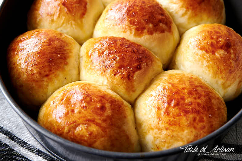 Baked pampushki in a spring form cake pan.