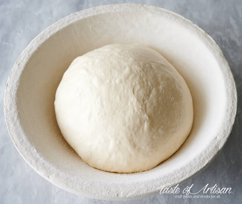 Bread dough in a proofing basket.