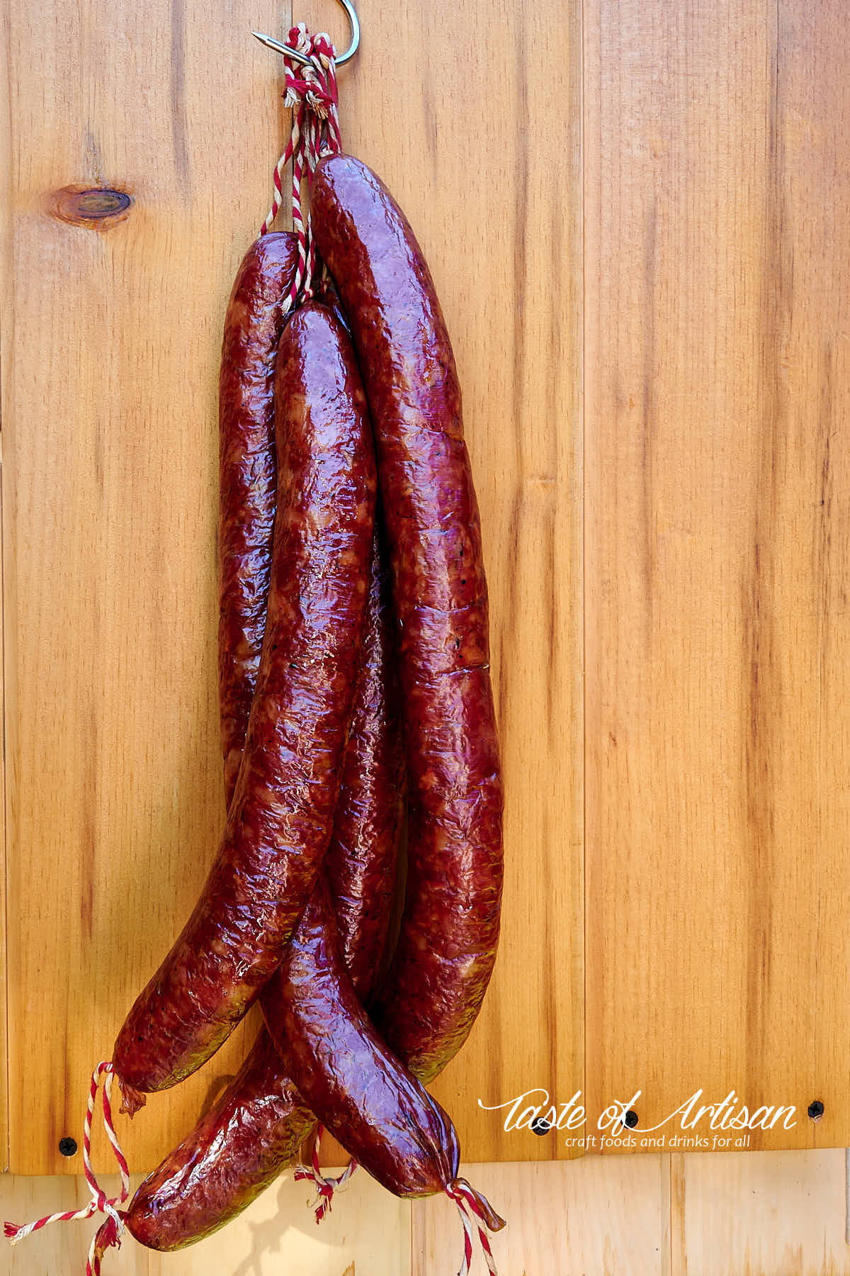 Dark mahogany color Andouille sausages after 7 hours of smoking.7