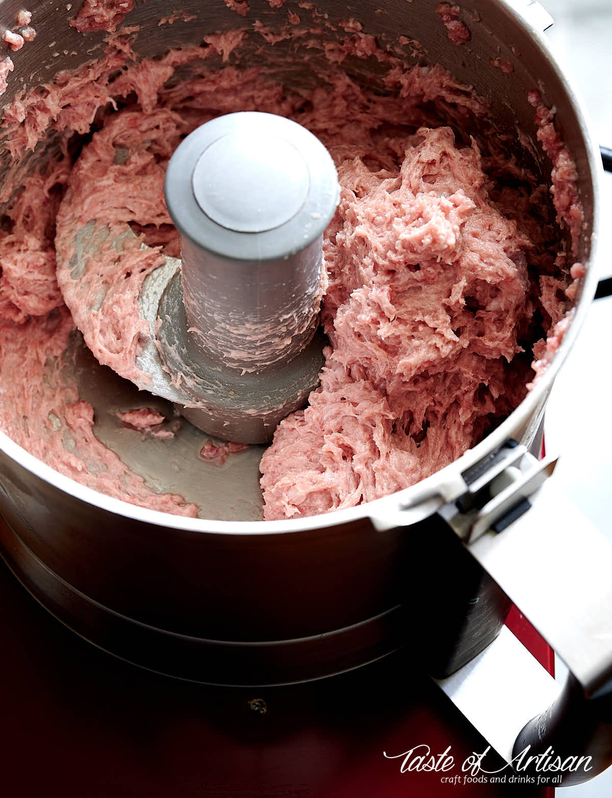 Emulsified meat inside Robot Coupe food processor.