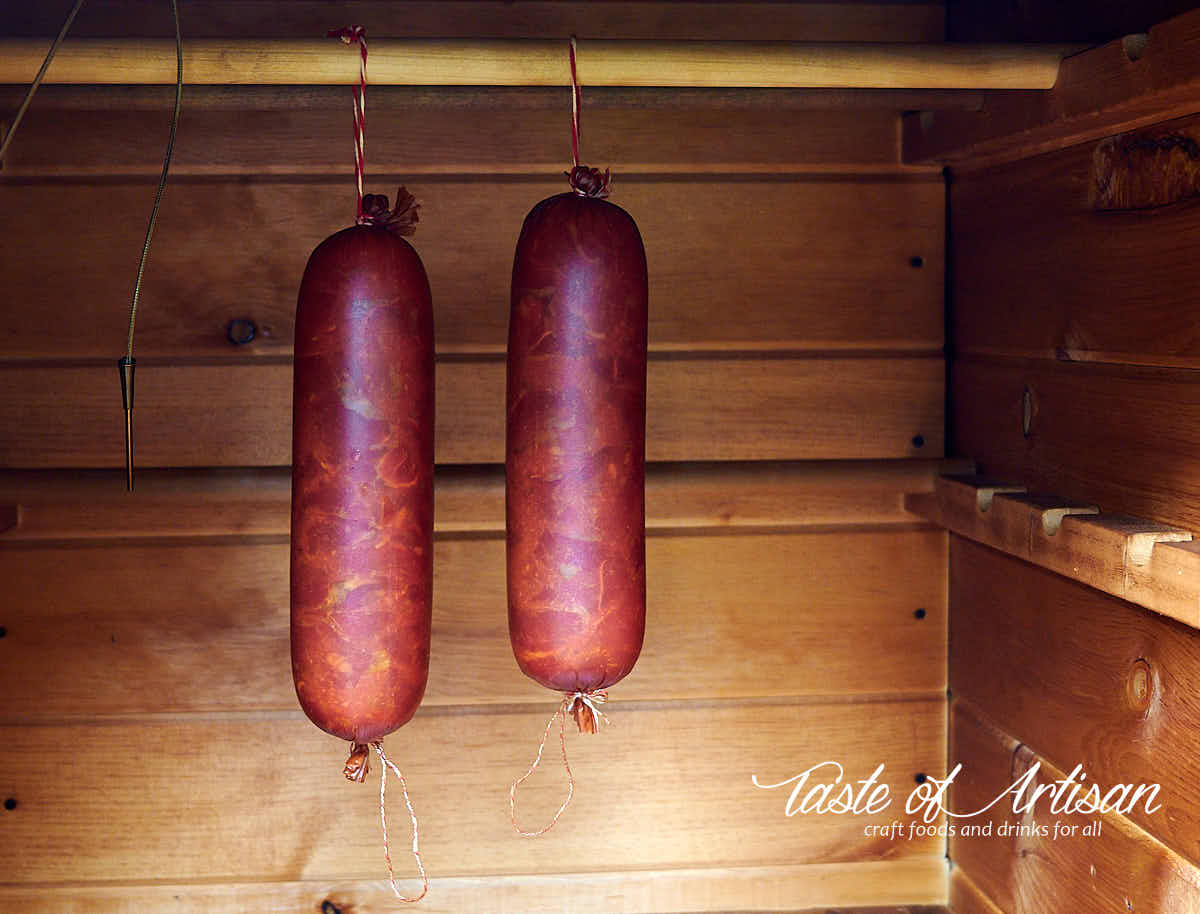 Krakow sausage inside smokehouse after 3 hours of smoking.