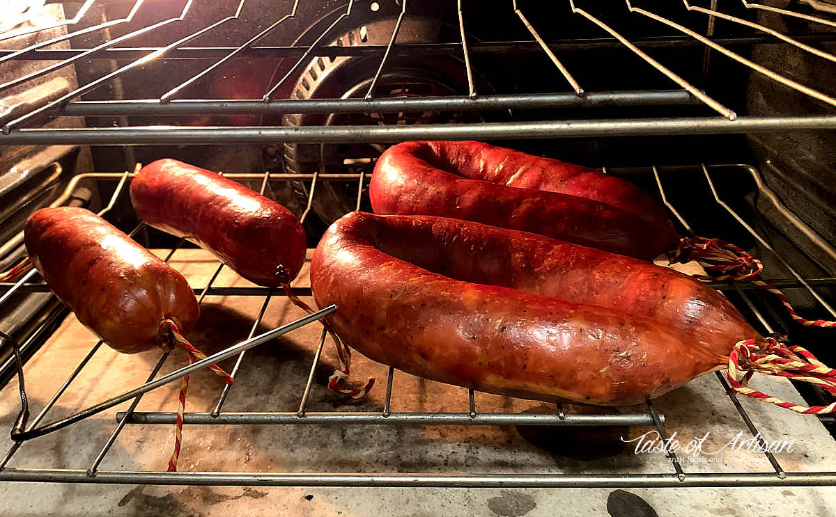Smoked kielbasa in the oven to finish cooking after smoking.