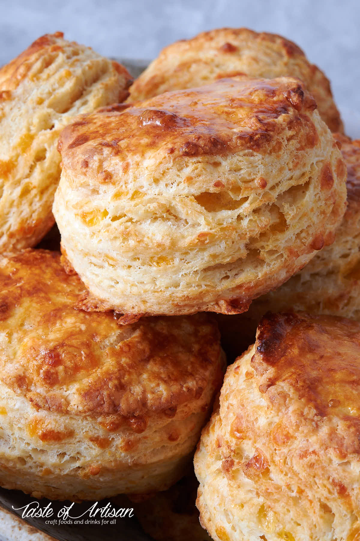 Close up of golden brown biscuits.