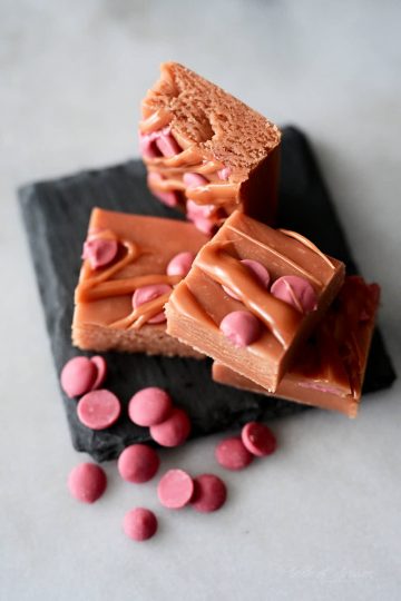 Top down view of chocolate fudge made with pink chocolate.