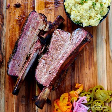 Sous Vide Beef Short Ribs on a cutting board.