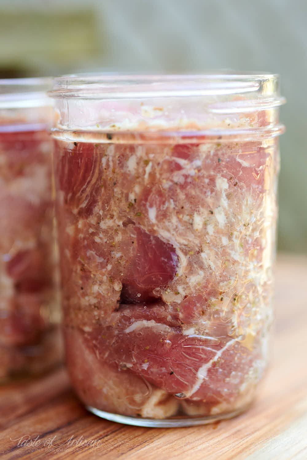 Pork stuffed in a glass jar.