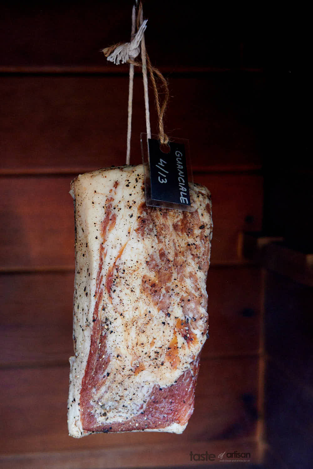 Guanciale in a smokehouse