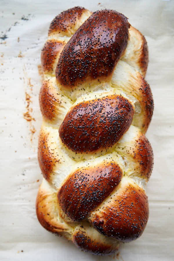 Challah bread on a baking sheet.