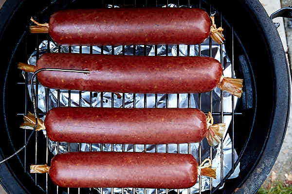 Pepperoni sausage on grill-smoker.