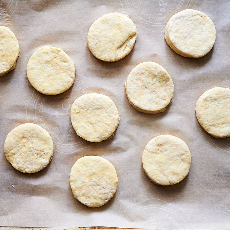 Sourdough biscuits on baking sheet