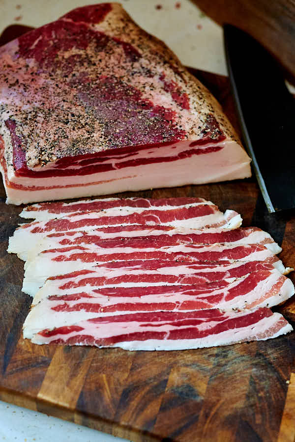 cured bacon on a board