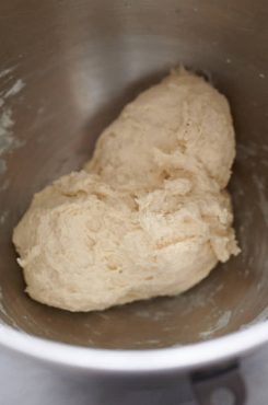 Mixing challah bread dough in a stand mixer.