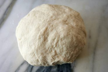 Finished dough for Uzbek bread obi non.