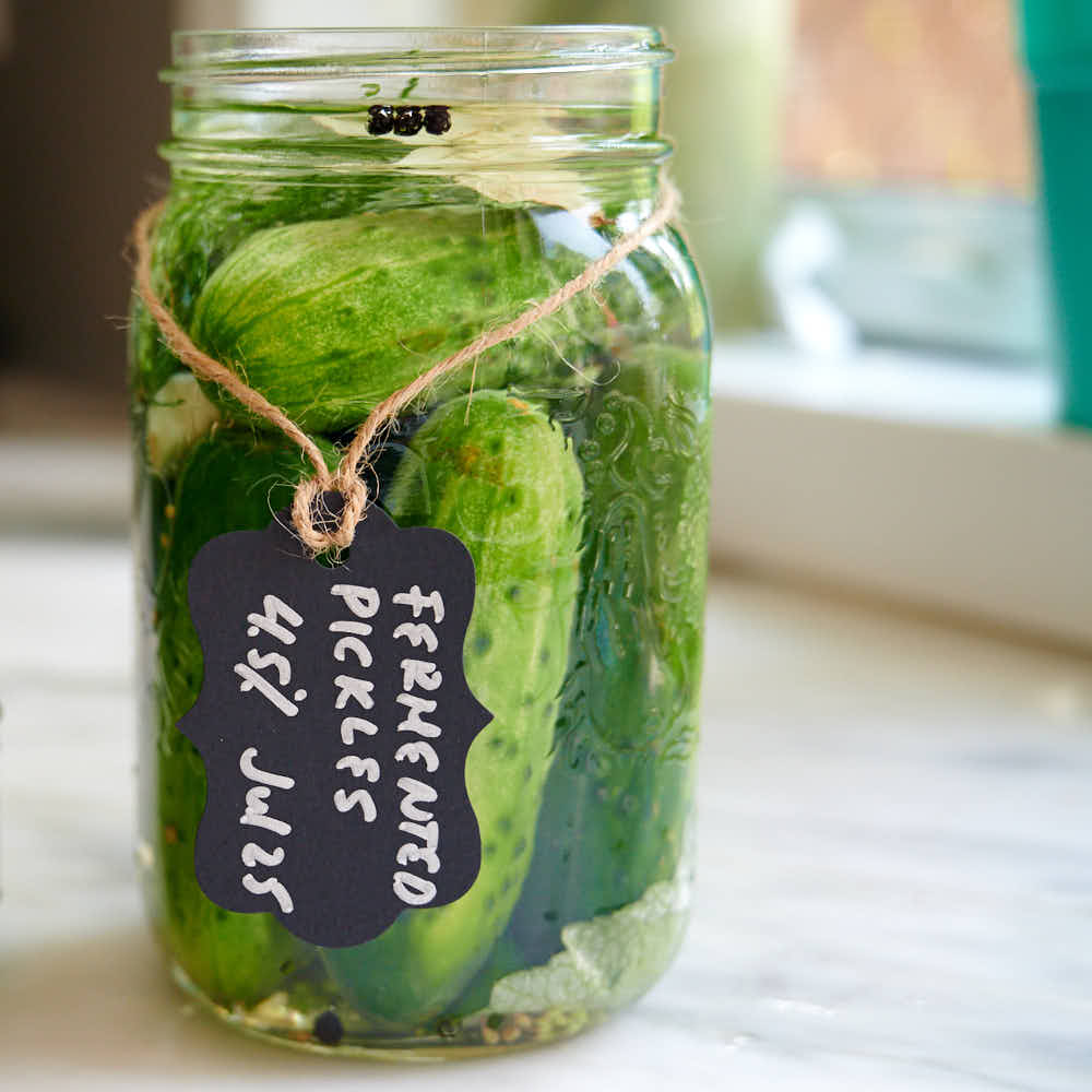 Preventing cucumbers from floating during fermentation.