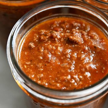 Homemade canned tomato sauce with meat.