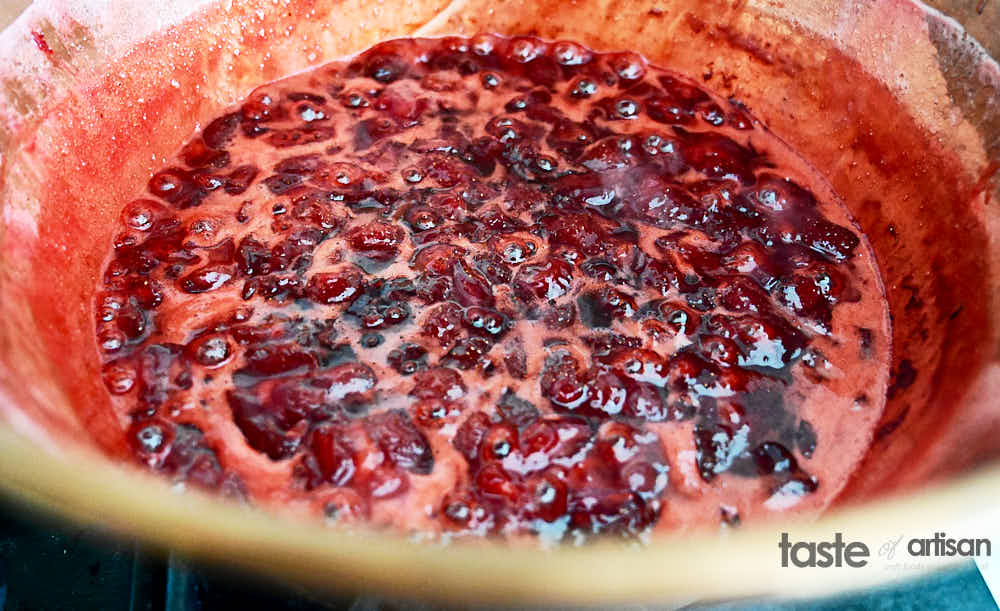 Strawberry jam getting thicker.