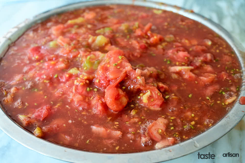 Chopped peeled tomatoes in a bowl.