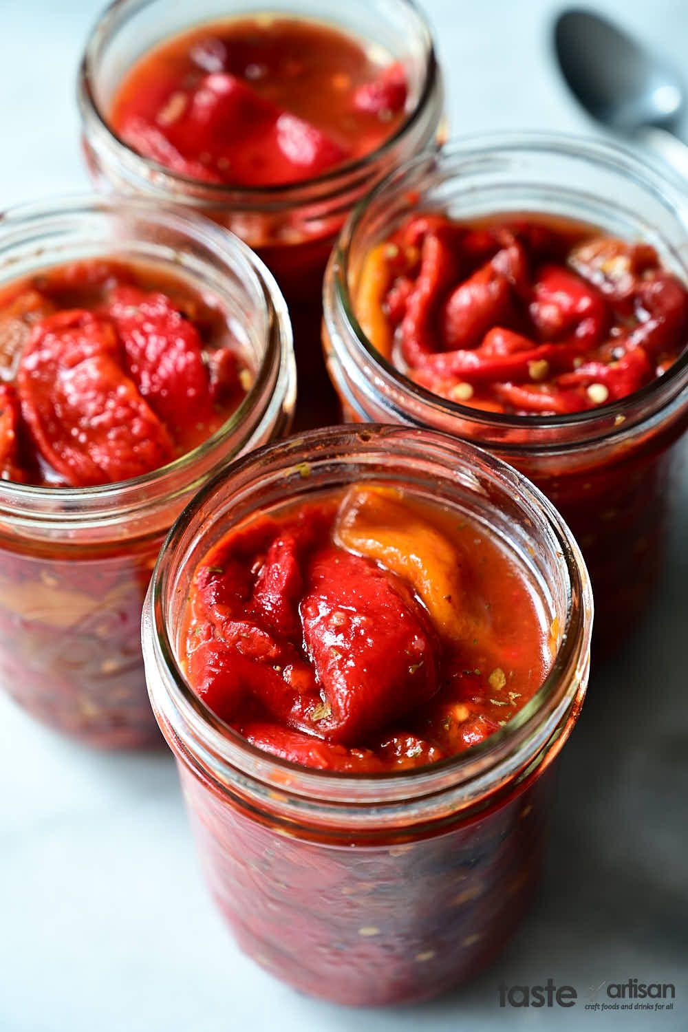 Filling jars with peppers.