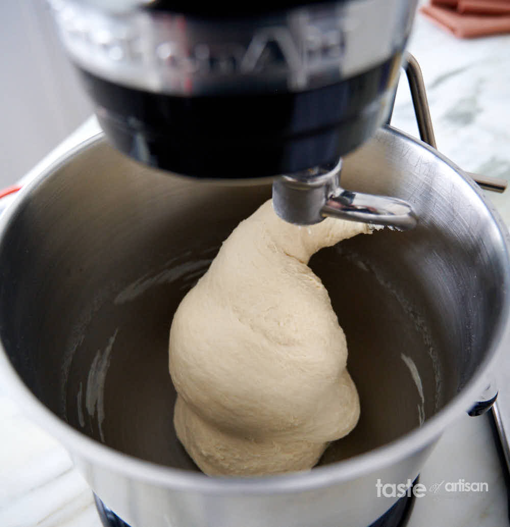 https://tasteofartisan.com/wp-content/uploads/2022/02/kneading-dough-in-stand-mixer.jpg