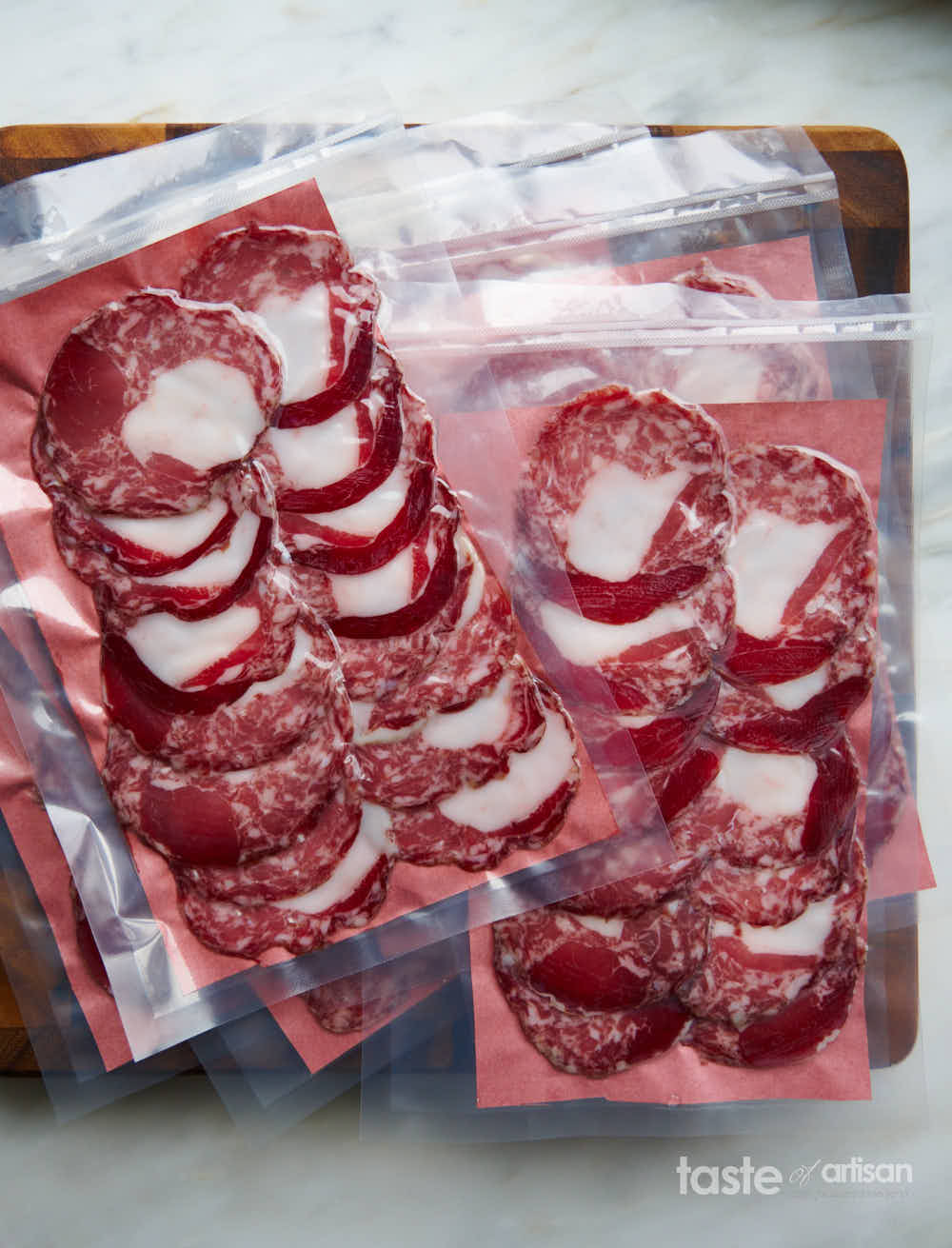 Sopressata salami sliced and vacuum packaged.