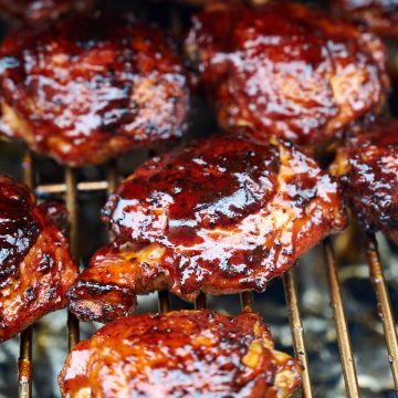 Smoked chicken thighs, with crisped up skin and glazed with a BBQ aauce