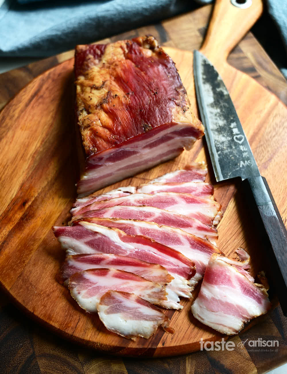 Sliced to eat smoked bacon cured with maple syrup and a touch of cayenne pepper.