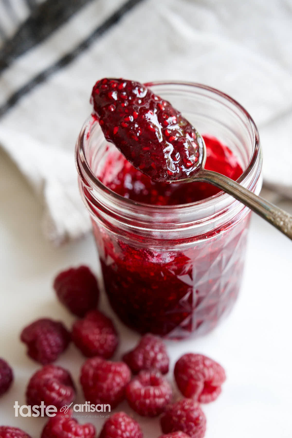 Homemade raspberry jam, using traditional raspeberry jam recipe.