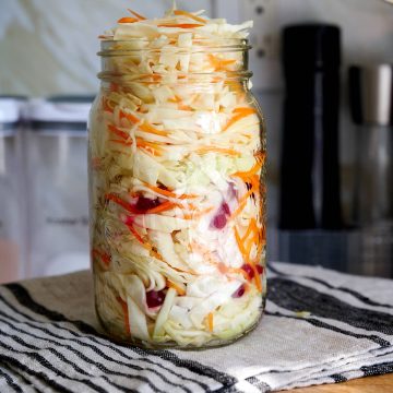Crunchy pickled cabbage. Made with a salty, sweet, and sour brine and a little bit of sunflower oil. Very crunchy and addictively tasty. A perfect healty side dish to grilled, BBQed and smoked meats.