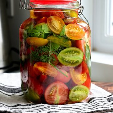 Cherry tomatoes pickled in sweet, salty, and sour brine.