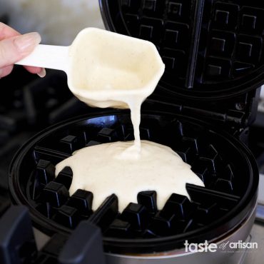 Pouring Sourdough Discard Waffle Batter in waffle iron