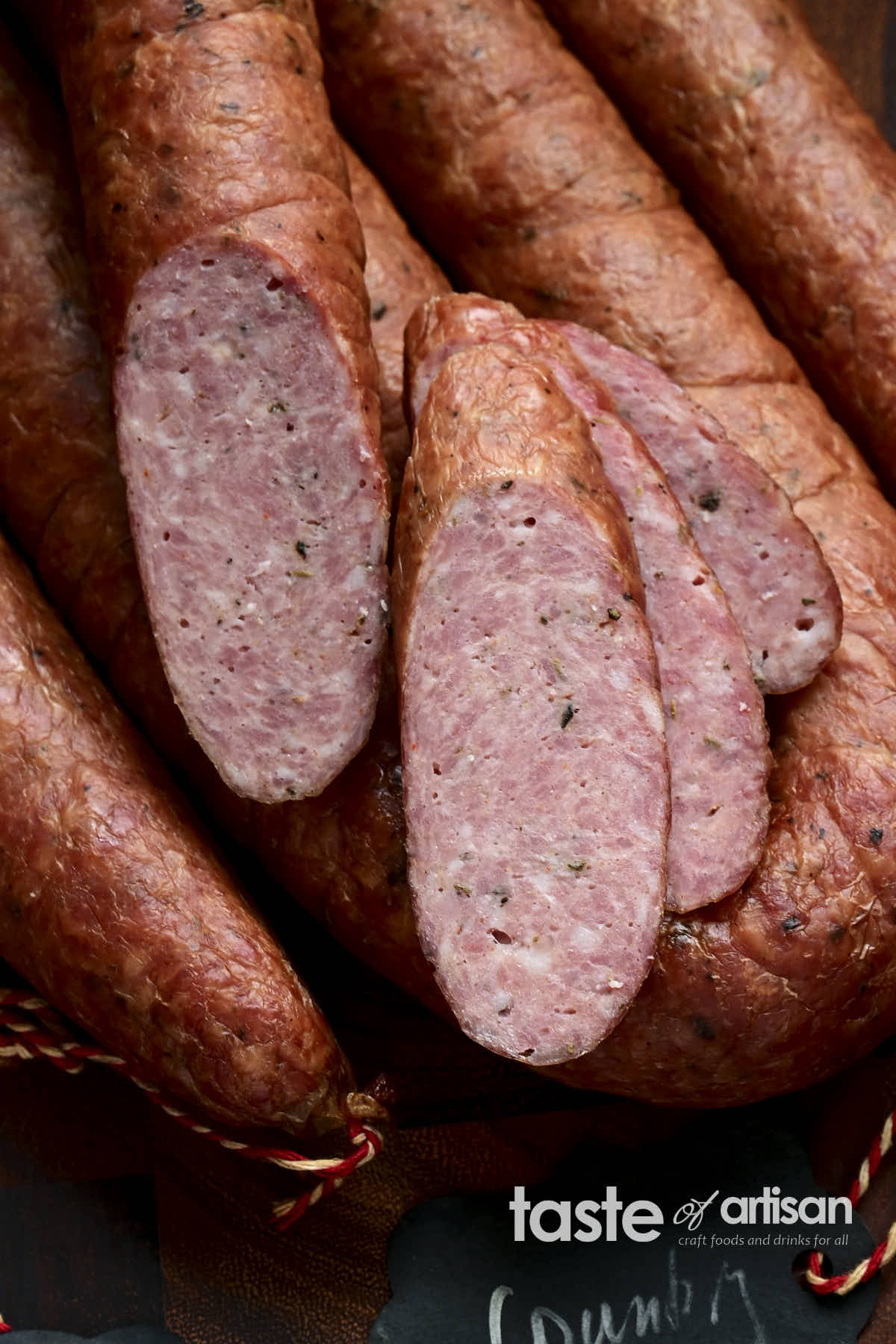 Close-up of Smoked Country Sausage cross-cut. Beautiful texture.