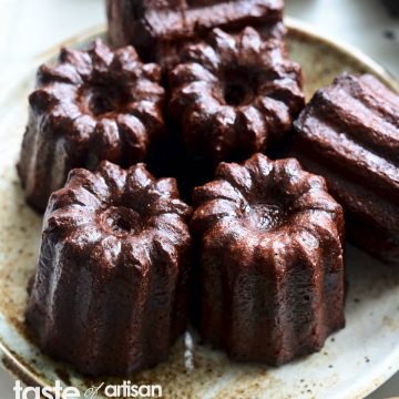 Close up of several Bordeaux specialty - chocolate canele pastries.