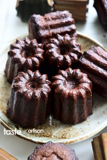 Close up of several Bordeaux specialty - chocolate canele pastries.