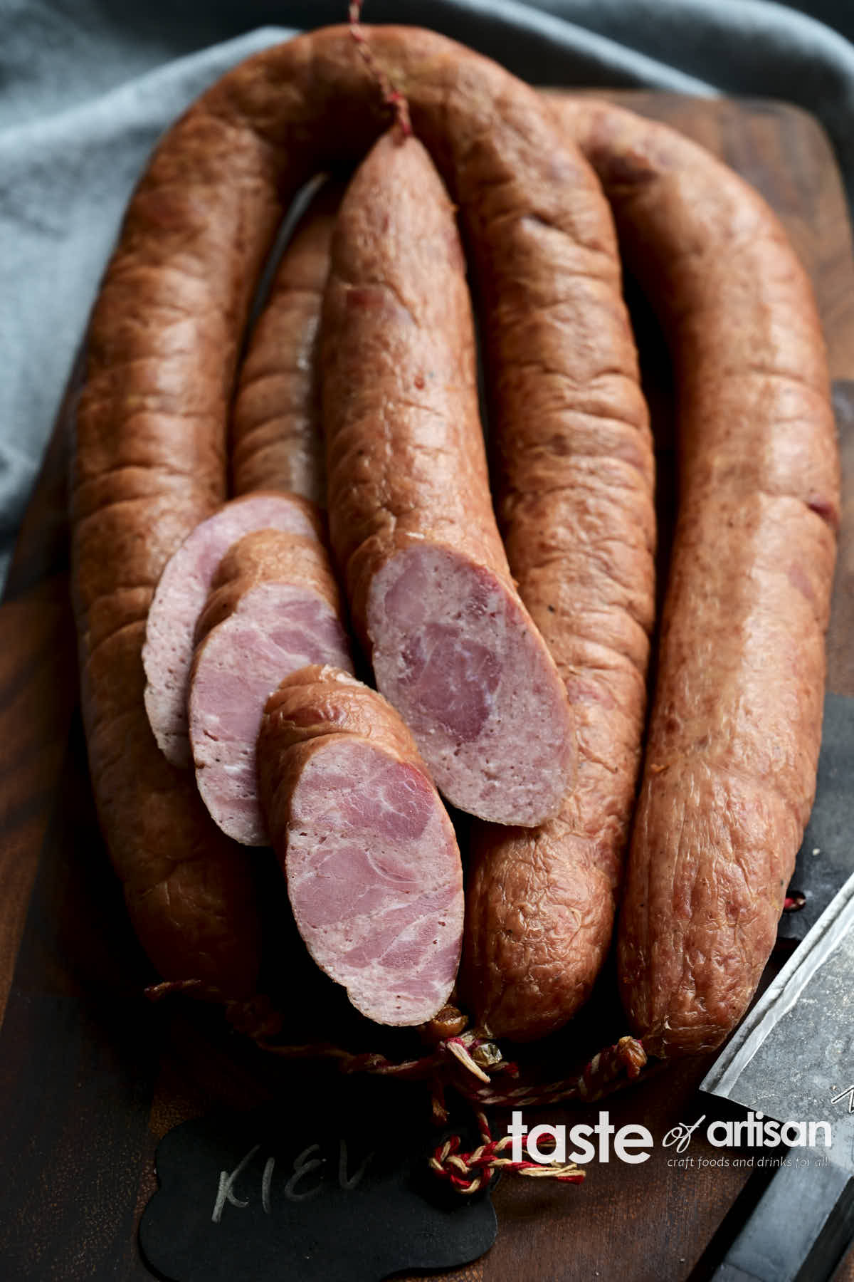 Kyiv smoked sausage is a lightly flavored but exceptionally tasty old-fashioned sausage with a delicate texture made using a new-to-me method whereby the sausage is first cooked and then smoked. You can think of it as a 'reverse-smoked' sausage. This one is a real crowd-pleaser.