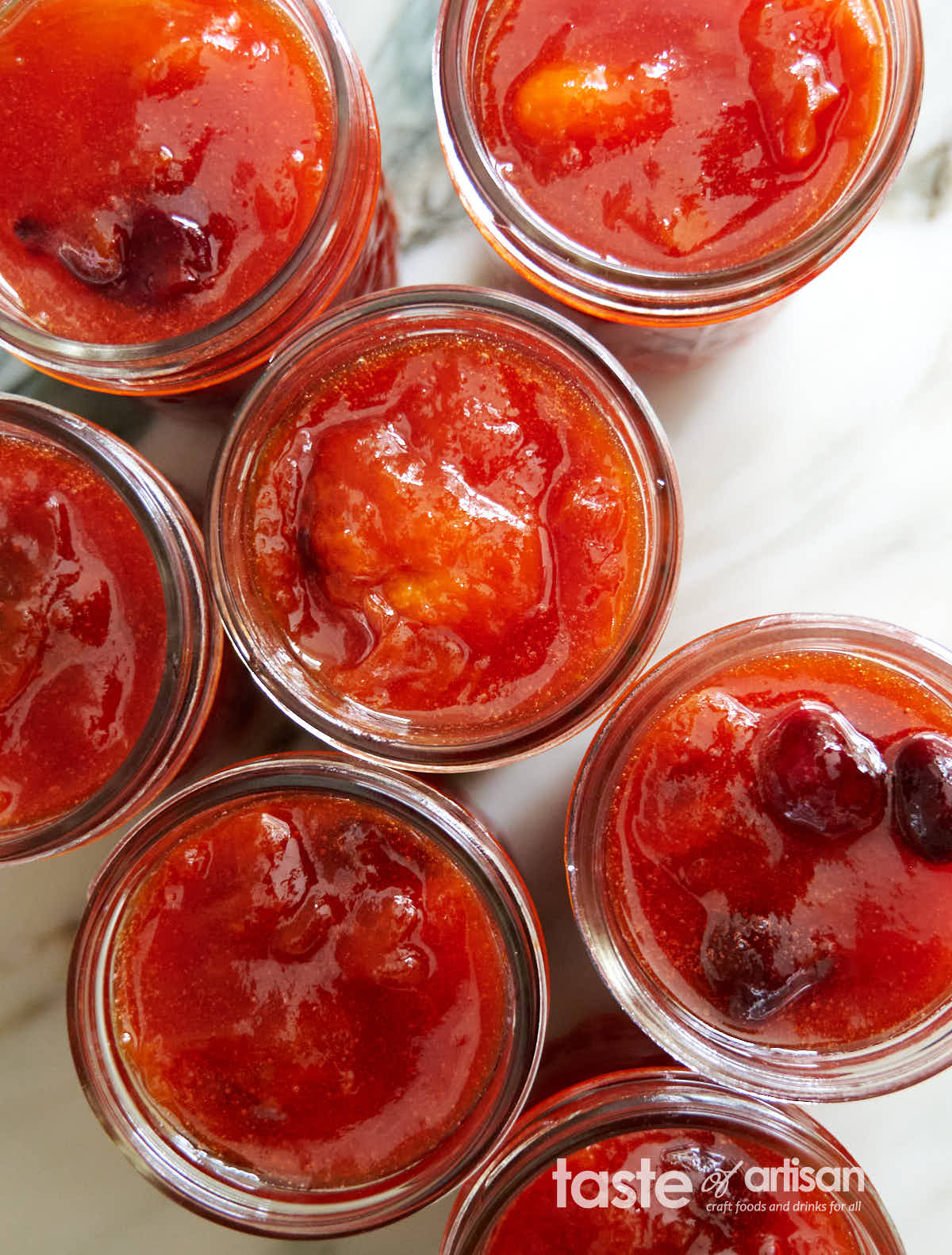 Apricot and sour cherry jam. Homemade with only fruit, sugar and some lemon juice. No additives, no preservatives, no pectin. Superb old-fashioned taste.