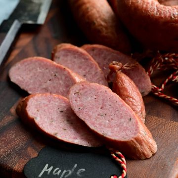 Smoked Maple Sausage - a mildly flavored sausage with a smooth texture, slight sweetness and notes of maple syrup. It makes a perfect snack, accompaniment to your charcuterie platter, or a meal.