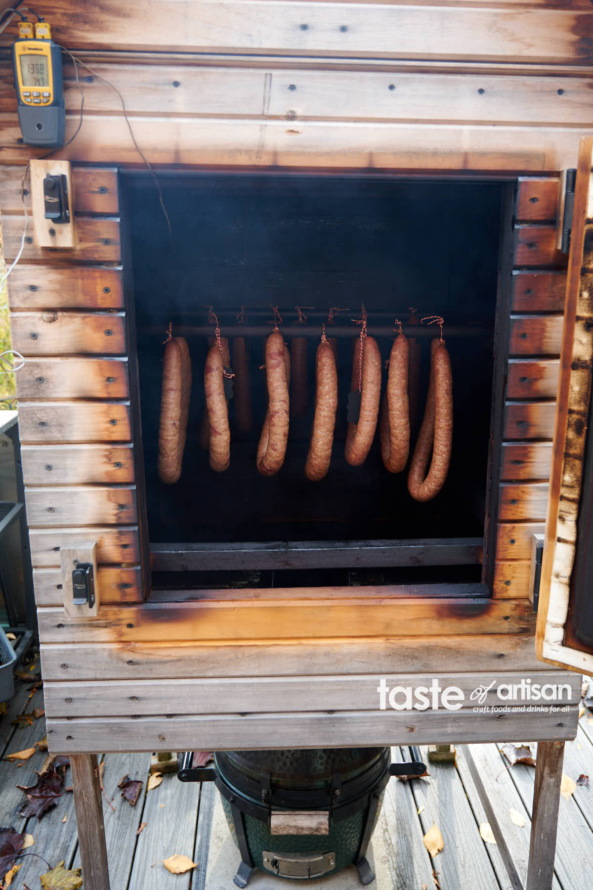 Sausage smoking in a smokehouse