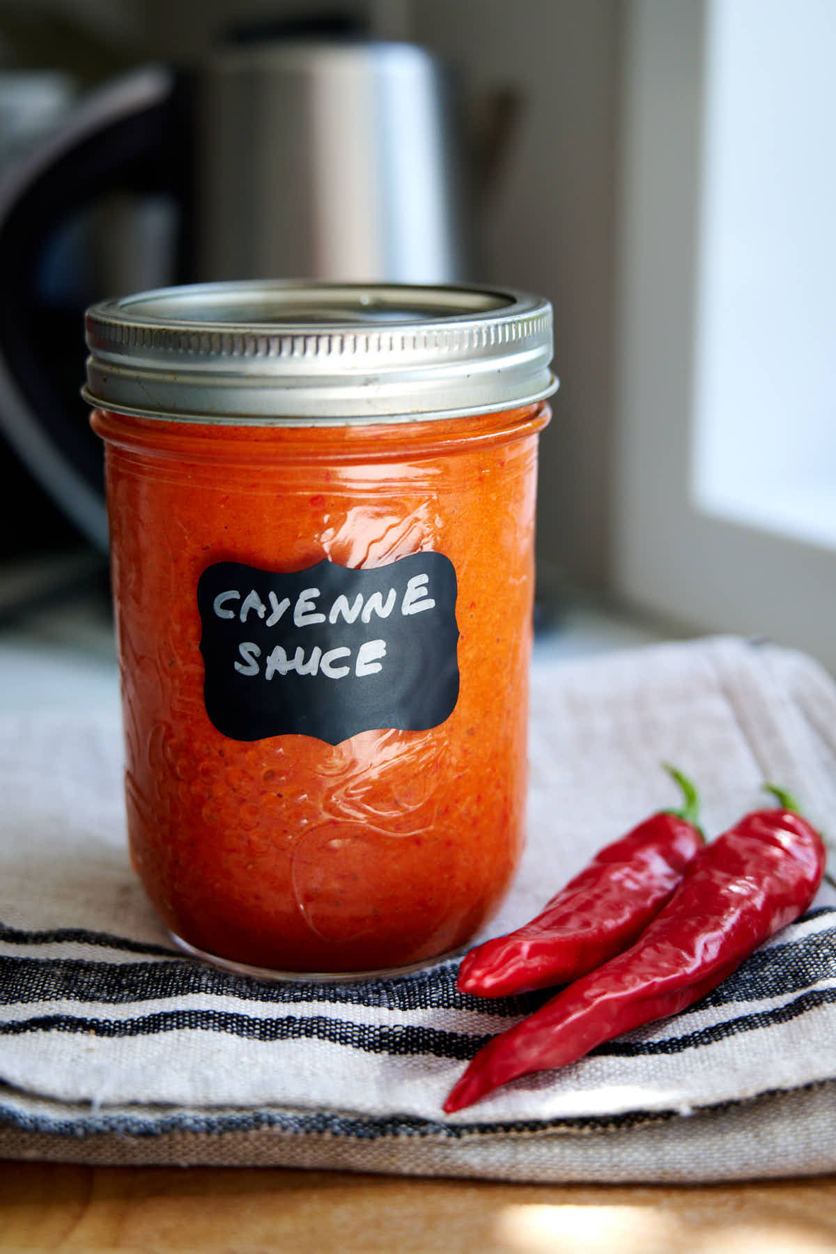 Homemade cayenne pepper sauce - creamy, full of sweet, tropical fruit notes with good heat and wonderful lingering aftertaste.